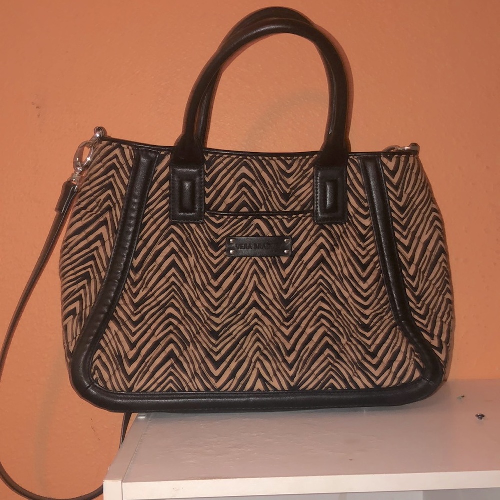 A striped hand bag